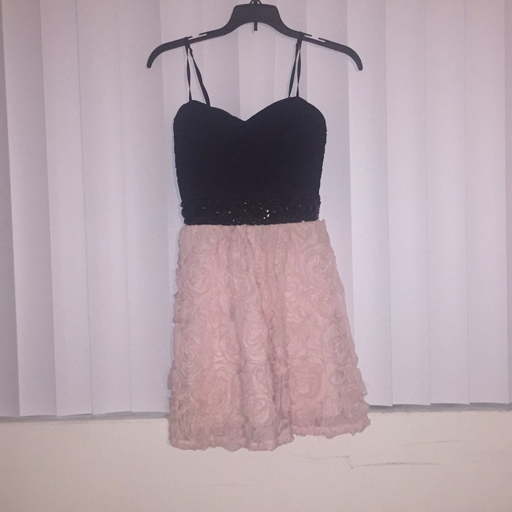 Pink and black cocktail dress.